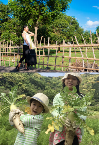 豊かな自然と特産物の野菜を持つ子供たち